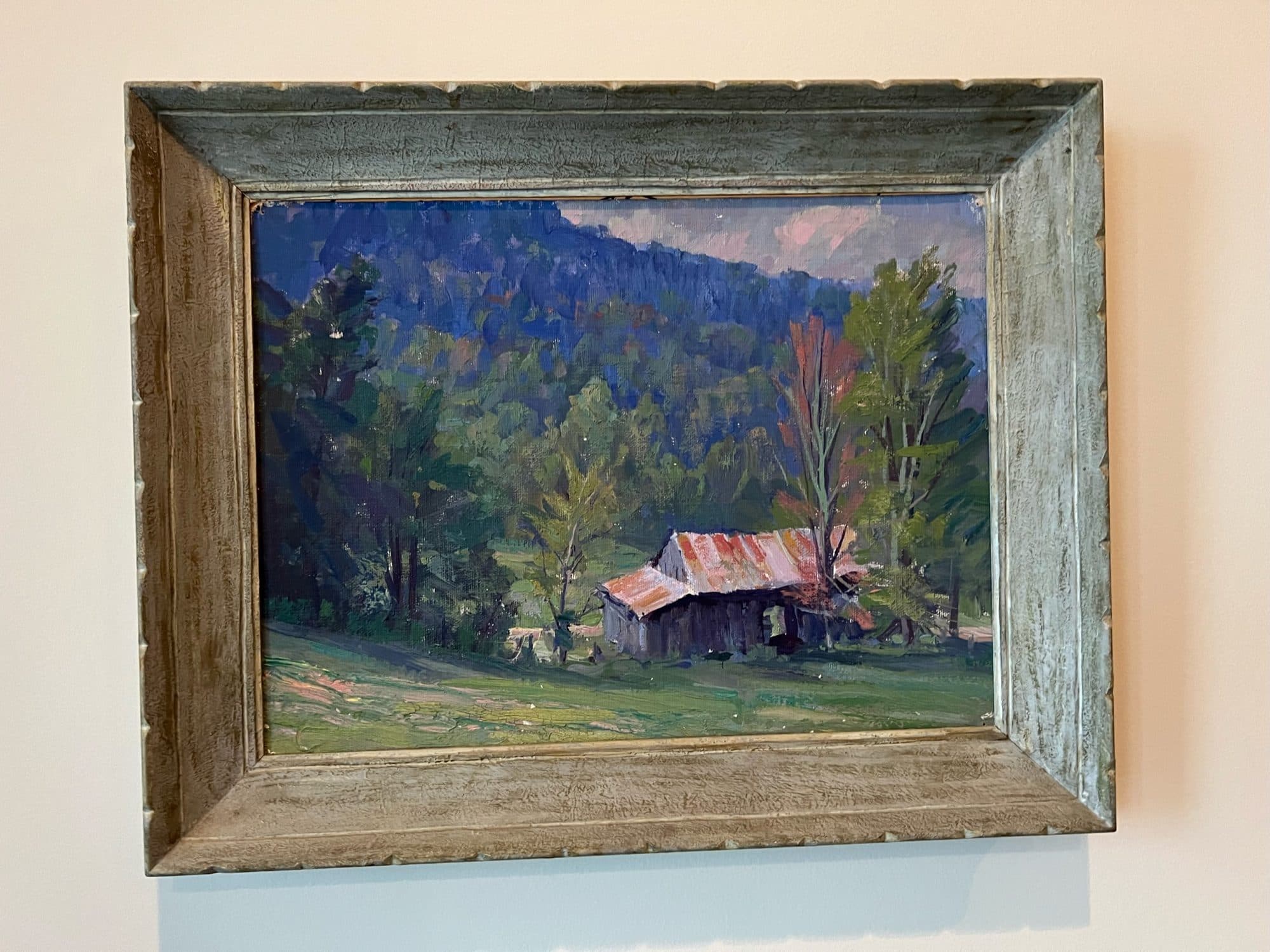 Red-Roofed Cabin In Mountain Meadow